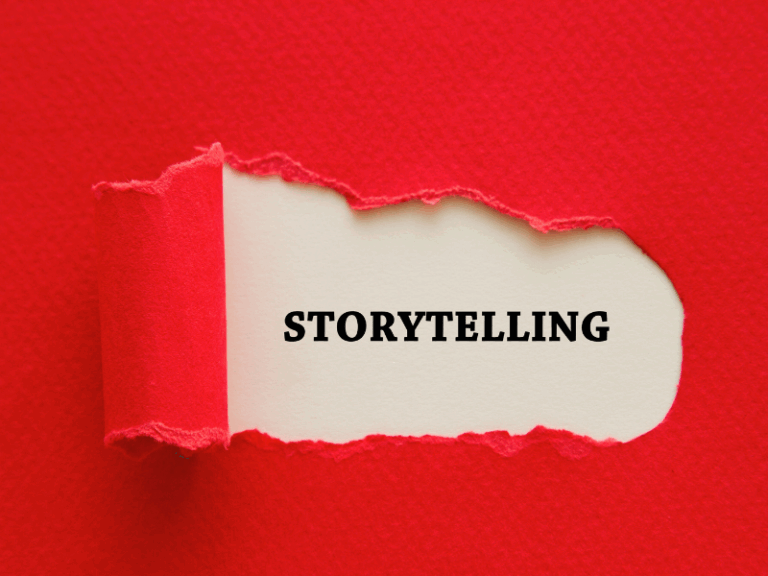 Roter Karton mit aufgerissenem Fenster, mit dem Wort „STORYTELLING“